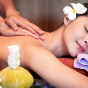 young-woman-having-massage-with-herbal-bags-spa-salon_35534-328.jpg